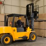 Forklift,Operator,Working,At,Warehouse,-,A,Series,Of,Metal
