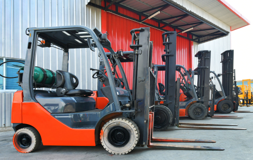 Parked,Forklifts,In,Warehouse,Front